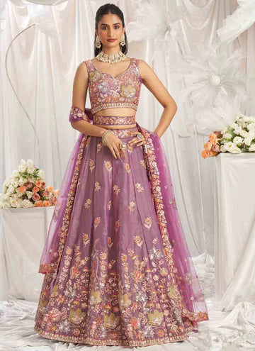 Captivating Onion pink colored silk fully embroidered lehenga choli with sequin zari work.